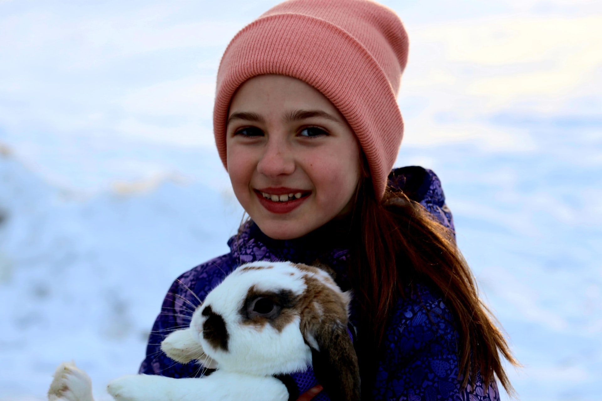 Rabbit Behavior_girl holding a rabbit