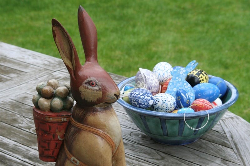 Do rabbits lay eggs _Easter eggs and a wooden rabbit