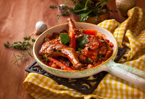 What is Rabbit Meat Called in a Restaurant_ Rabbit Stew, vegetables and herbs.