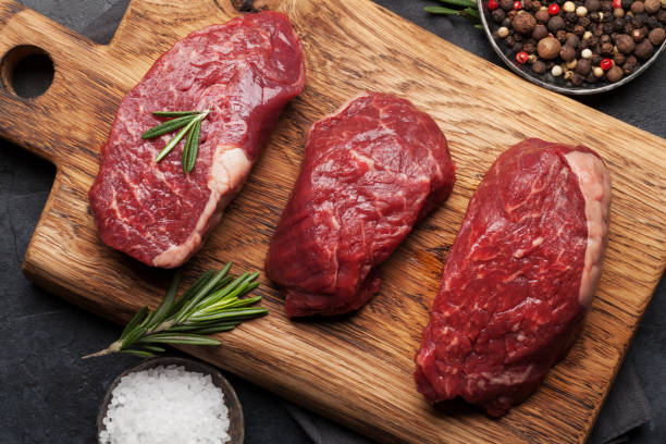 Are Rabbits considered Red Meat_ Red Meat and herbs on a board