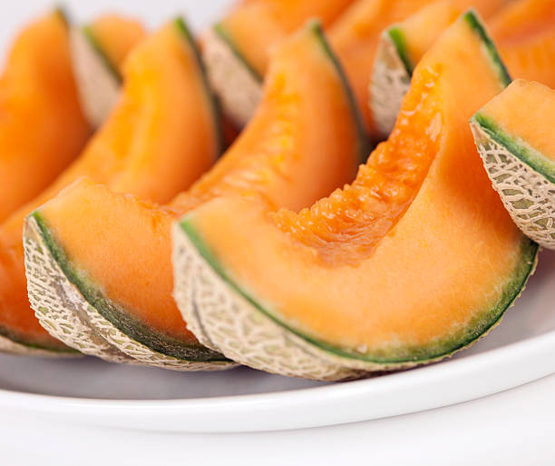 Can Rabbits Eat Cantaloupe Melon_ A plate of sliced Cantaloupe melons