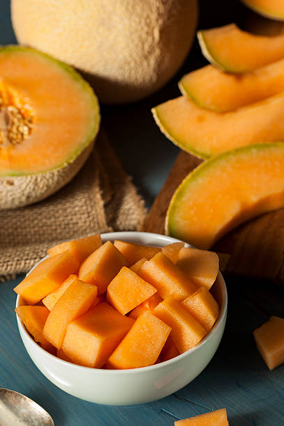 Can Rabbits eat Cantaloupe Melon_ A bowl containing chunks of Cantaloupe Melon